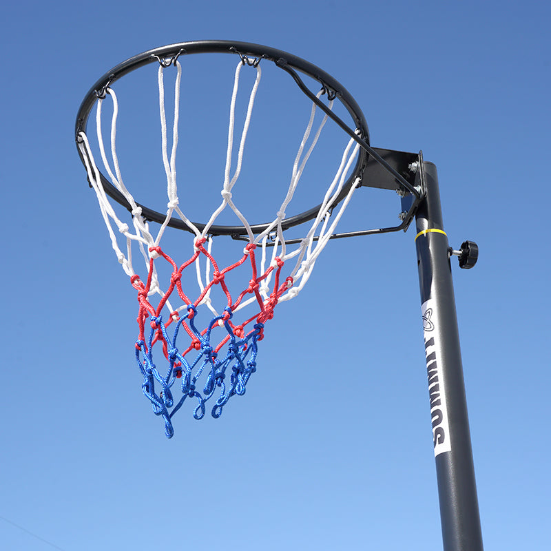 Netball ring and net against a clear blue sky